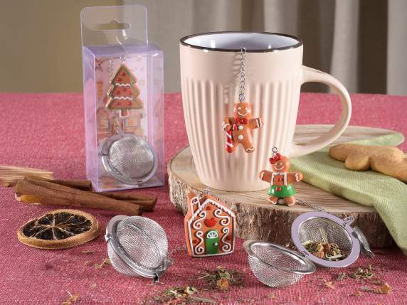 Infusor de acero inoxidable y decoración navideña en resina