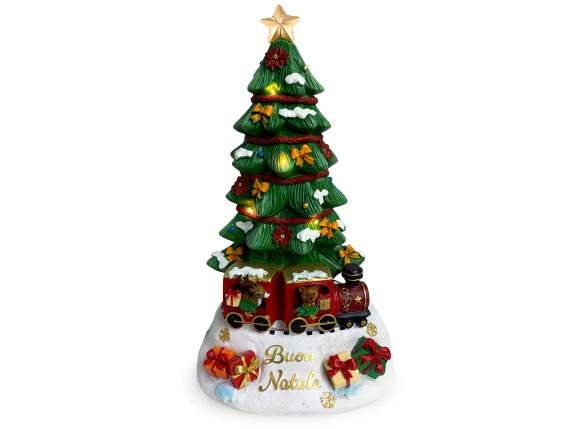 Árbol de Navidad de resina con luces y música.