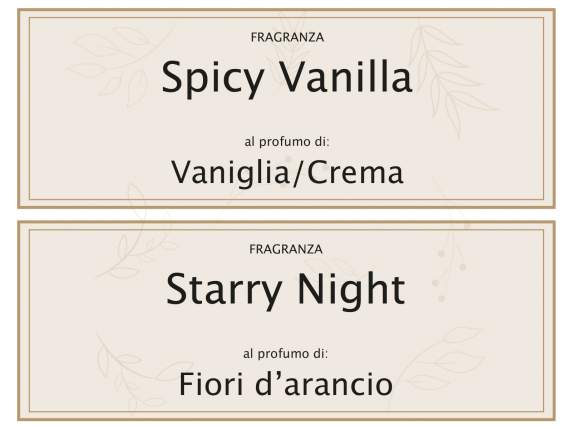 Candela profumata in bicchiere in vetro con decori dorati