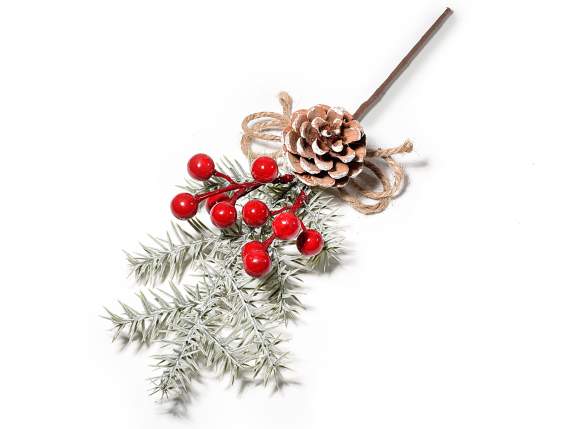 Sprig with snow-covered pine cone, red berries and rope bow