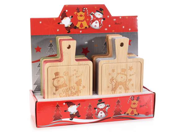 Wooden cutting board with Christmas decorations on display o