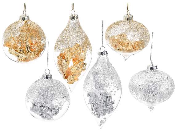 Glass ornament with precious decoration to hang on display