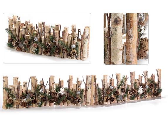 Decorative birch fence with pine cones and decorations