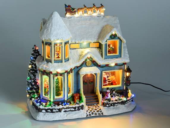 Christmas house with multicolored lights, movement and music