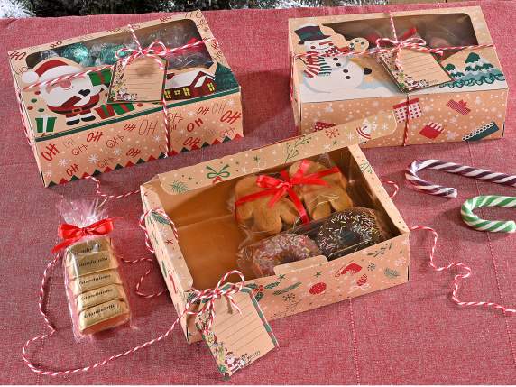Kraft paper box with Christmas decorations, ribbon and tag