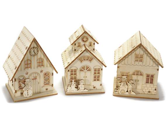 Laser-worked wooden Christmas house with LED light