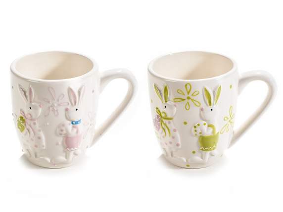 Colored ceramic mug with emboirded bunnies