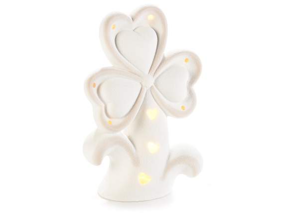 Trébol de porcelana con luz led y adornos de corazón