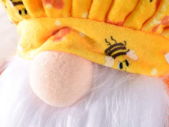 Gnomo de miel de tela con herramienta de madera y abeja