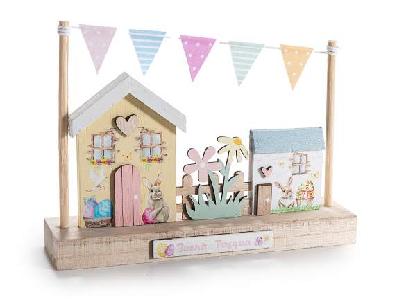 Paisaje madera con casas, flores y escrita Feliz Pascua