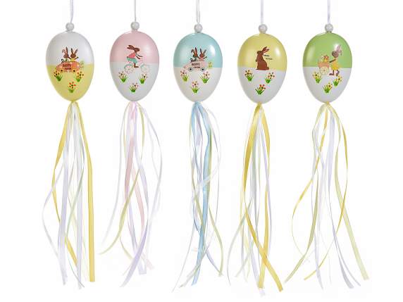 Decorative egg to hang with hanging colored ribbons
