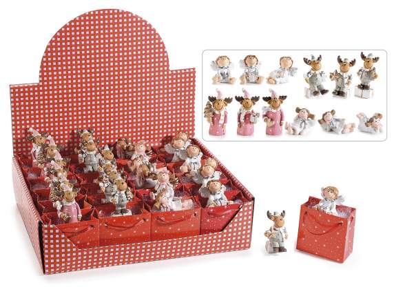 Display of 24 resin Christmas figures to be placed in a hand