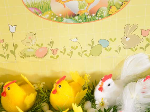 Display of 12 chickens with eggs and flowers on grass