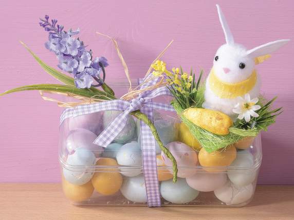 Display 12 rabbits with carrot and flowers on a clod of gras