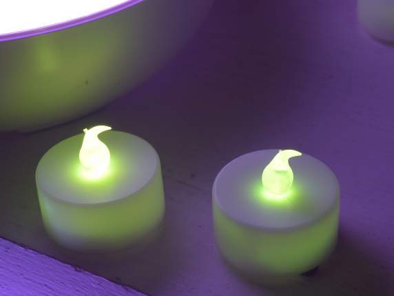 Battery tealight candle in display with iridescent light