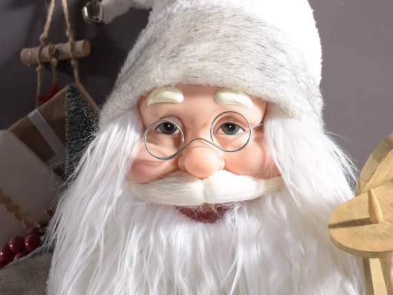 Babbo Natale con abito maglia, sci legno, sacco porta doni