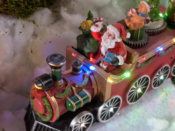 Babbo Natale in treno c-movimento, luci multicolore e musica