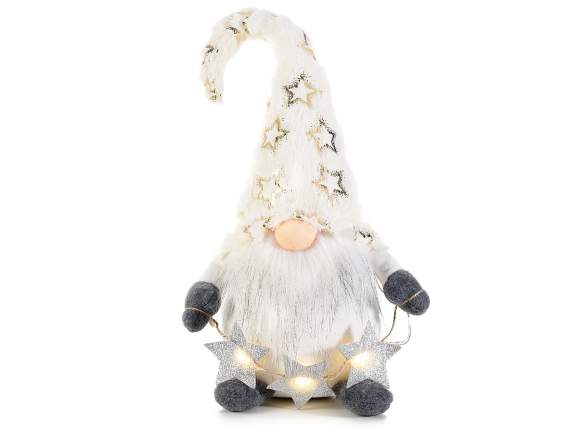 Père Noël en tissu avec une longue barbe et des guirlandes