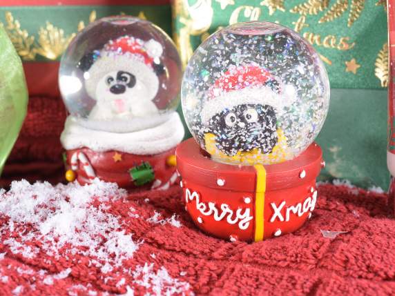 Boule à neige avec animaux de Noël sur socle en résine