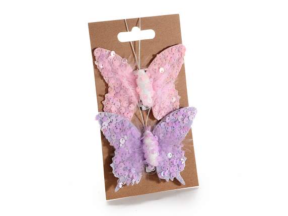 Blister con 2 farfalle in paillettes colorate con clip
