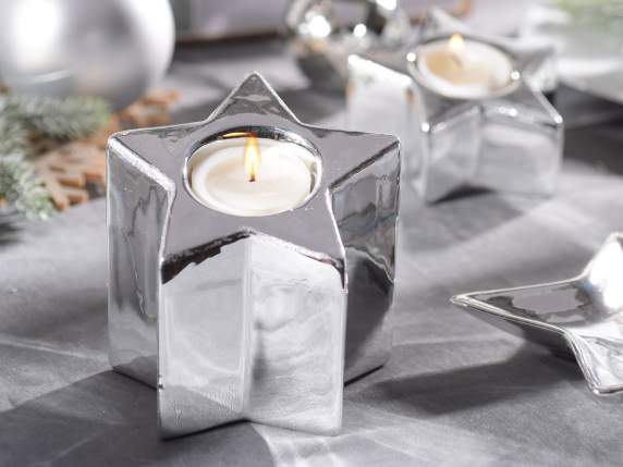 Set aus 2 sternförmigen Kerzenhaltern aus silbernem Porzella