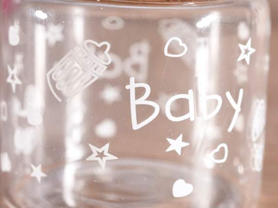 Reagenzglas mit Babydekoration und Korkstopfen