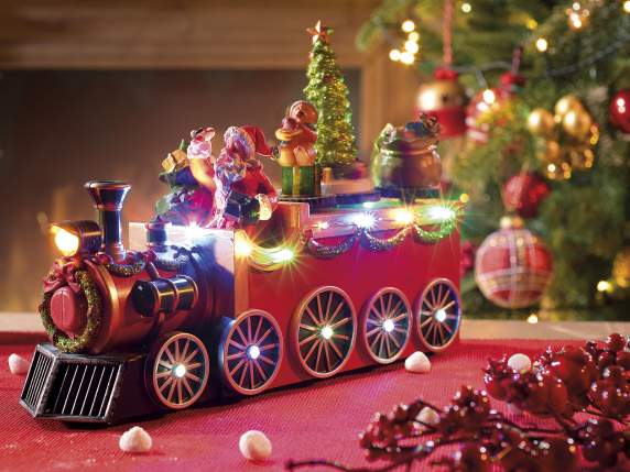 Weihnachtsmann in einem Zug mit Bewegung, bunten Lichtern un