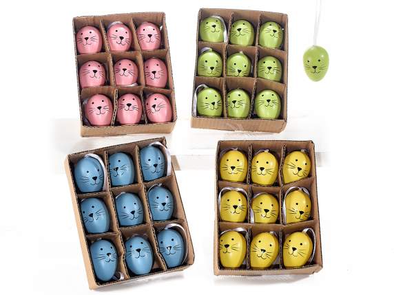 Hanging 9 colored plastic eggs with bunny face display