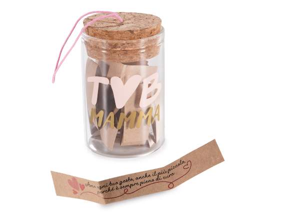 Tube à essai avec décorations de maman, bouchon et notes