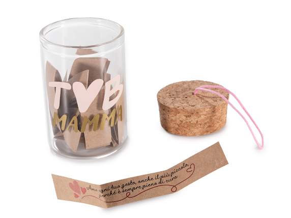 Tube à essai avec décorations de maman, bouchon et notes