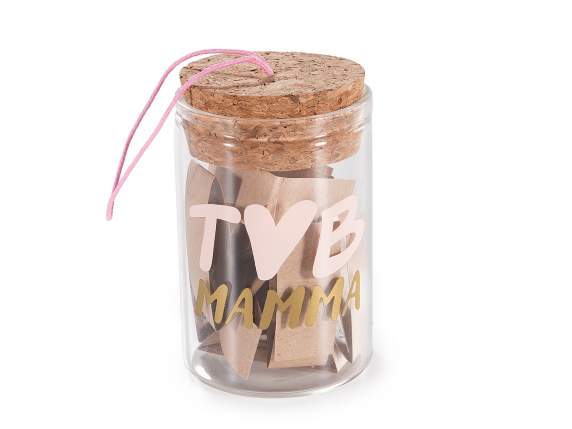 Tube à essai avec décorations de maman, bouchon et notes