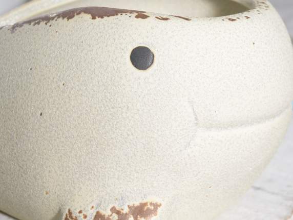 Candela profumata in vaso di terracotta a balena