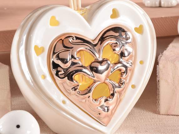 Cuore in porcellana con luce led e stick legno per profumare