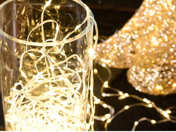 Filo luci 80m con 800 LED bianco caldo, cavo trasparente