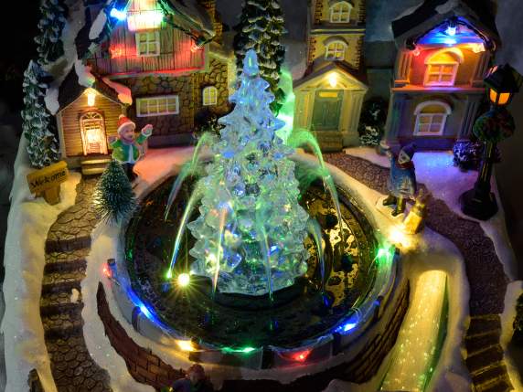 Paesaggio natalizio in resina con luci, fontana e musica