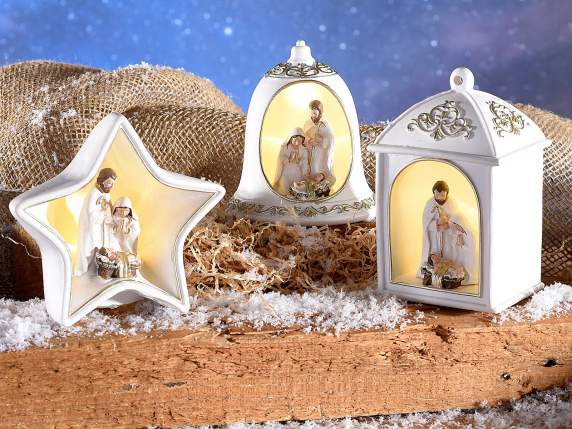 Presepe in resina bianca e dettagli dorati e luce led