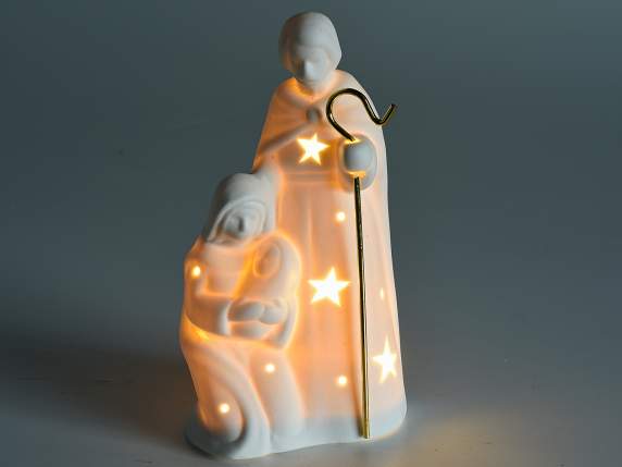 Belén de porcelana blanca con detalle dorado y luces LED