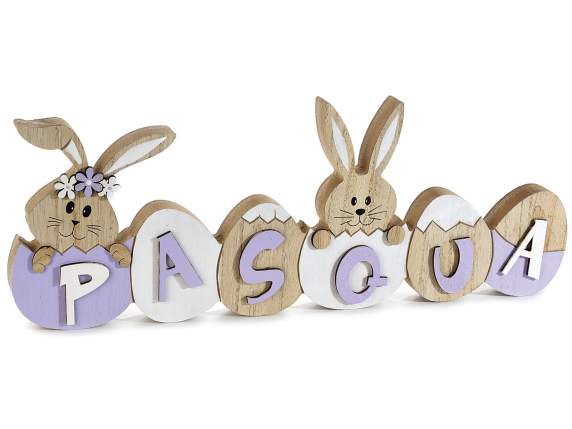 Pascua escrito en madera de colores con huevos y conejitos