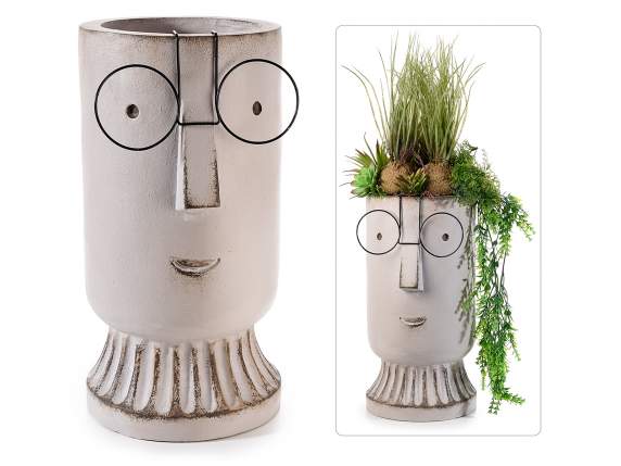 Long magnesia flower vase in the shape of a face with glasse