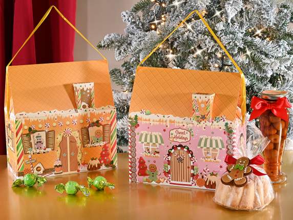 Caja de papel navideña con forma de casa y asa