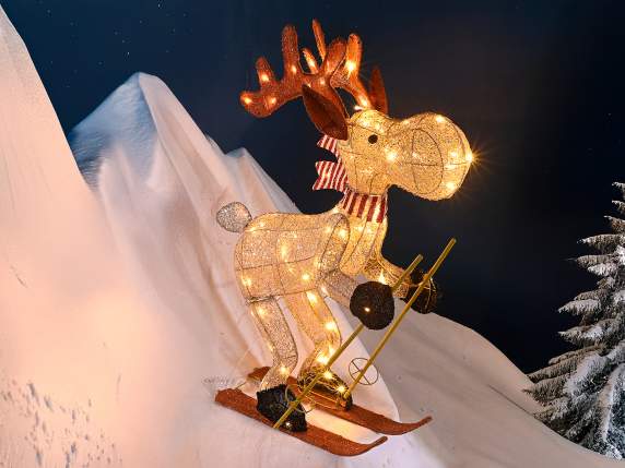 Reno sobre esquís con núcleo metálico y luces LED