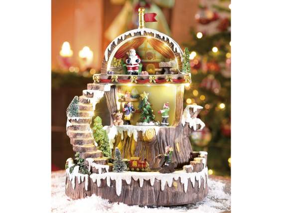 Paisaje navideño con movimiento, luces blancas cálidas y mús