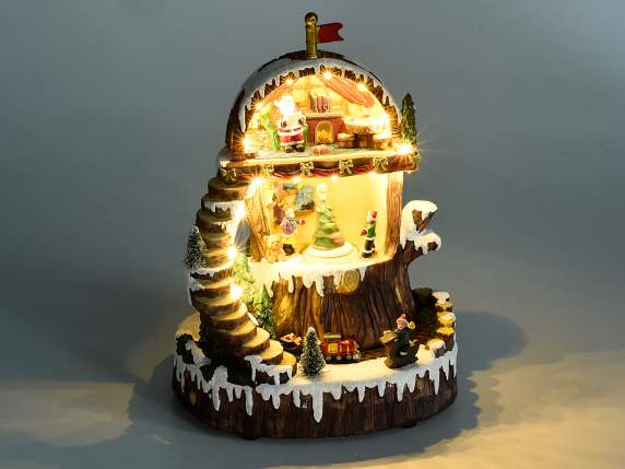 Paisaje navideño con movimiento, luces blancas cálidas y mús