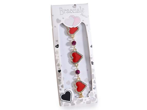 Pulsera metal con corazones lacados y pedrería con tarjeta