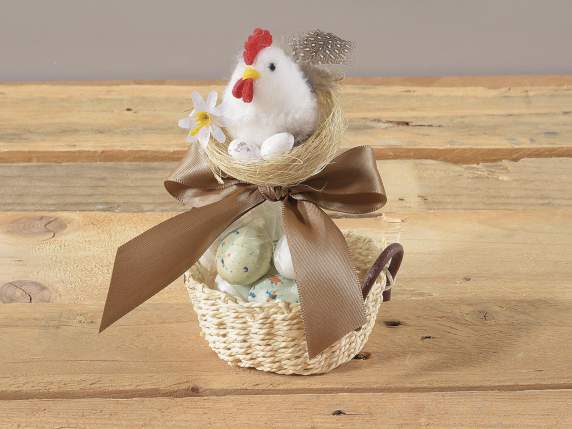 Présentation de 12 poules dans un nid avec des œufs