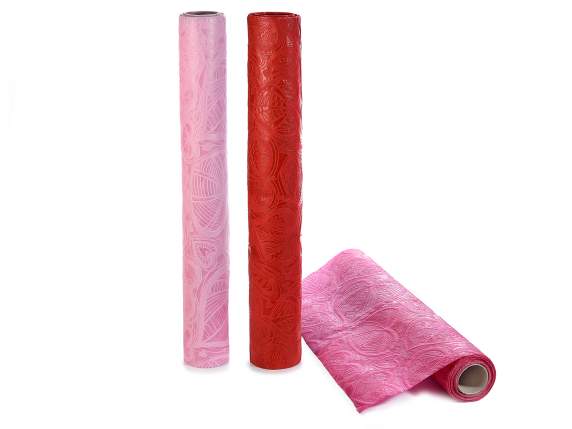 Non woven fabric roll with embossed heart decoration
