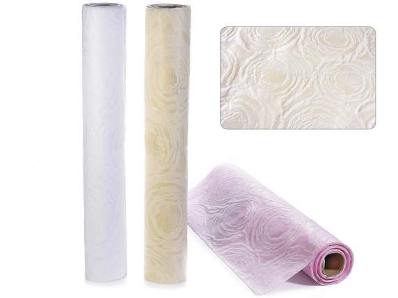 Non woven fabric roll with embossed rose decoration