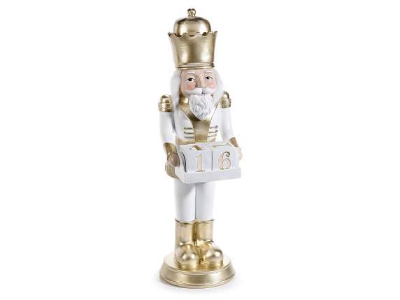 Resin nutcracker with gold details and calendar