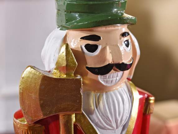 Resin nutcracker to stand with golden details