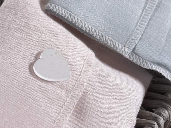 Pink fabric bag with wooden heart and velcro closure
